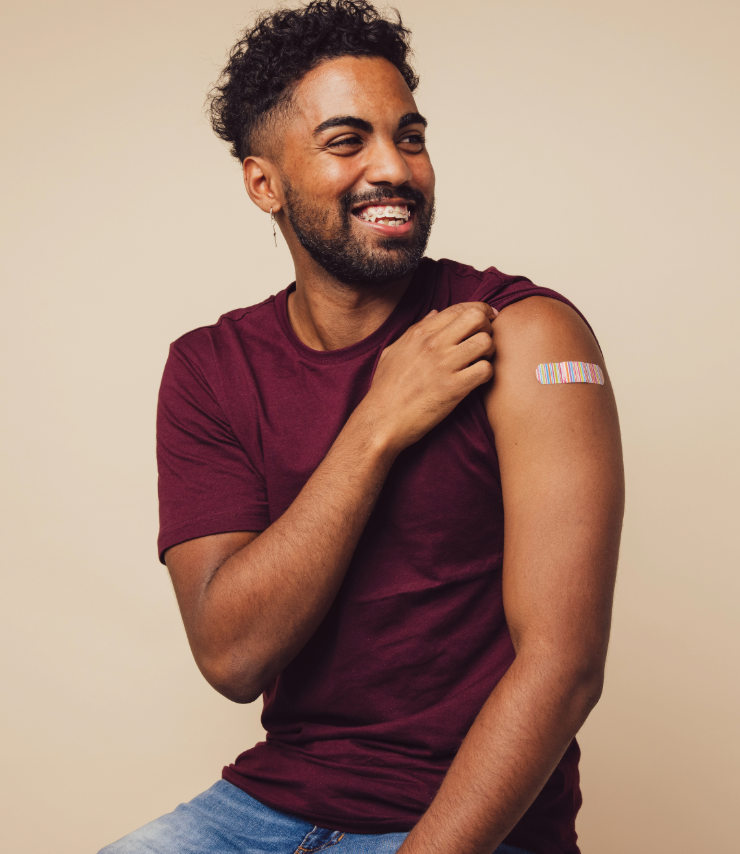 Man with plaster after getting vaccination